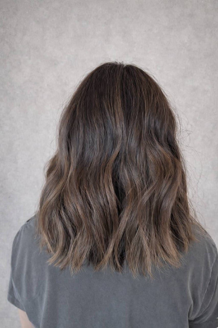 Medium length brunette with soft dimension